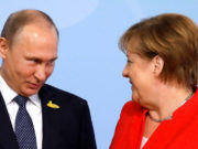 Путин и Меркель обменялись поздравлениями