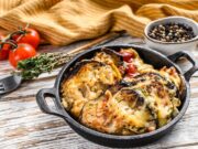 Свинина по-французски в духовке с помидорами, сыром и грибами